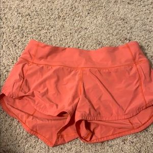 Orange lululemon shorts